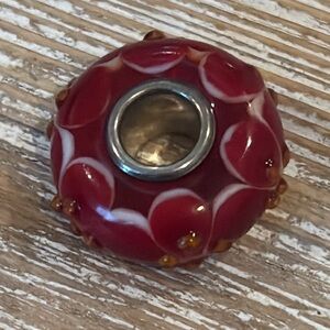 TROLLBEADS red glass bead white raised floral design sterling silver core